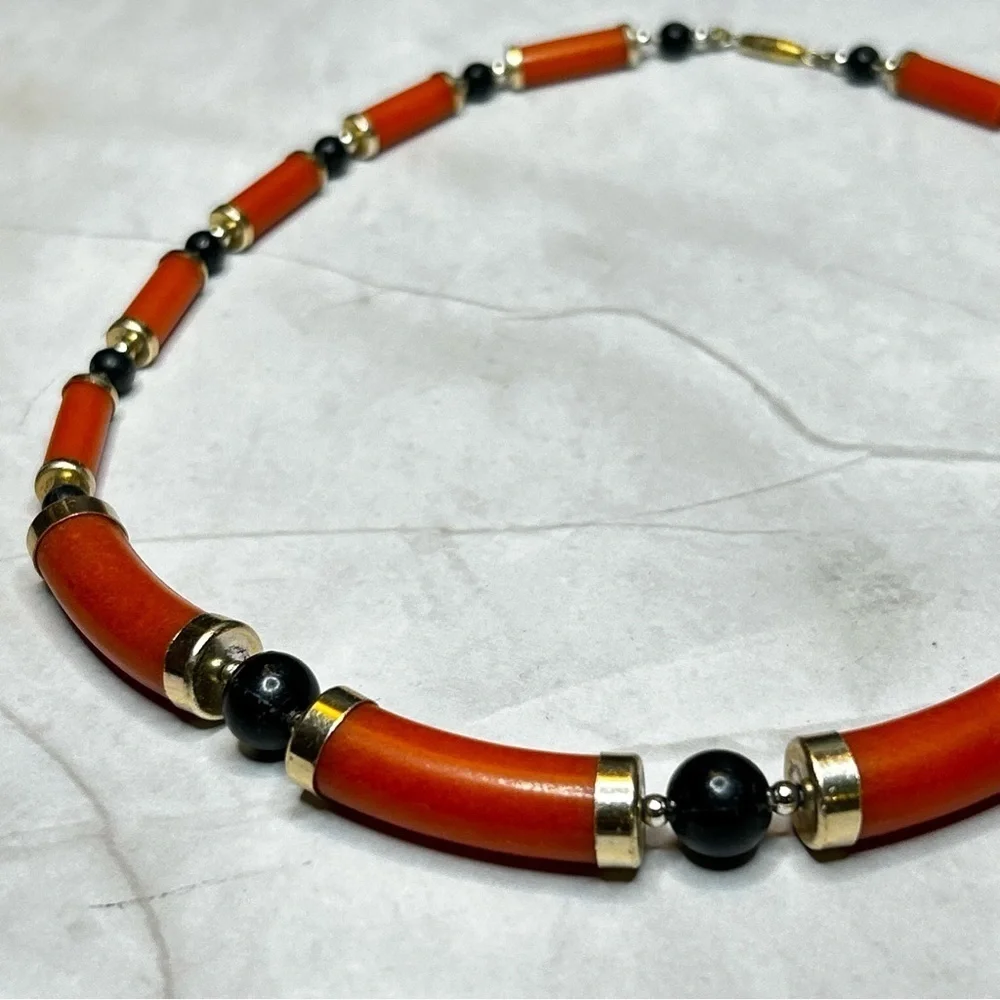 Unique Orange and Black Beaded Necklace with Gold Tone Accents